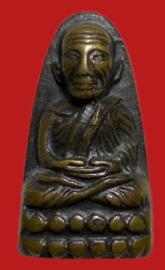 305442 หลวงปู่ทวด วัดช้างให้  หลังหนังสือเล็ก  พิมพ์ ว หัวห่าง  เนื้อทองเหลืองรมดำ  ปี2505 จ.ปัตตานี