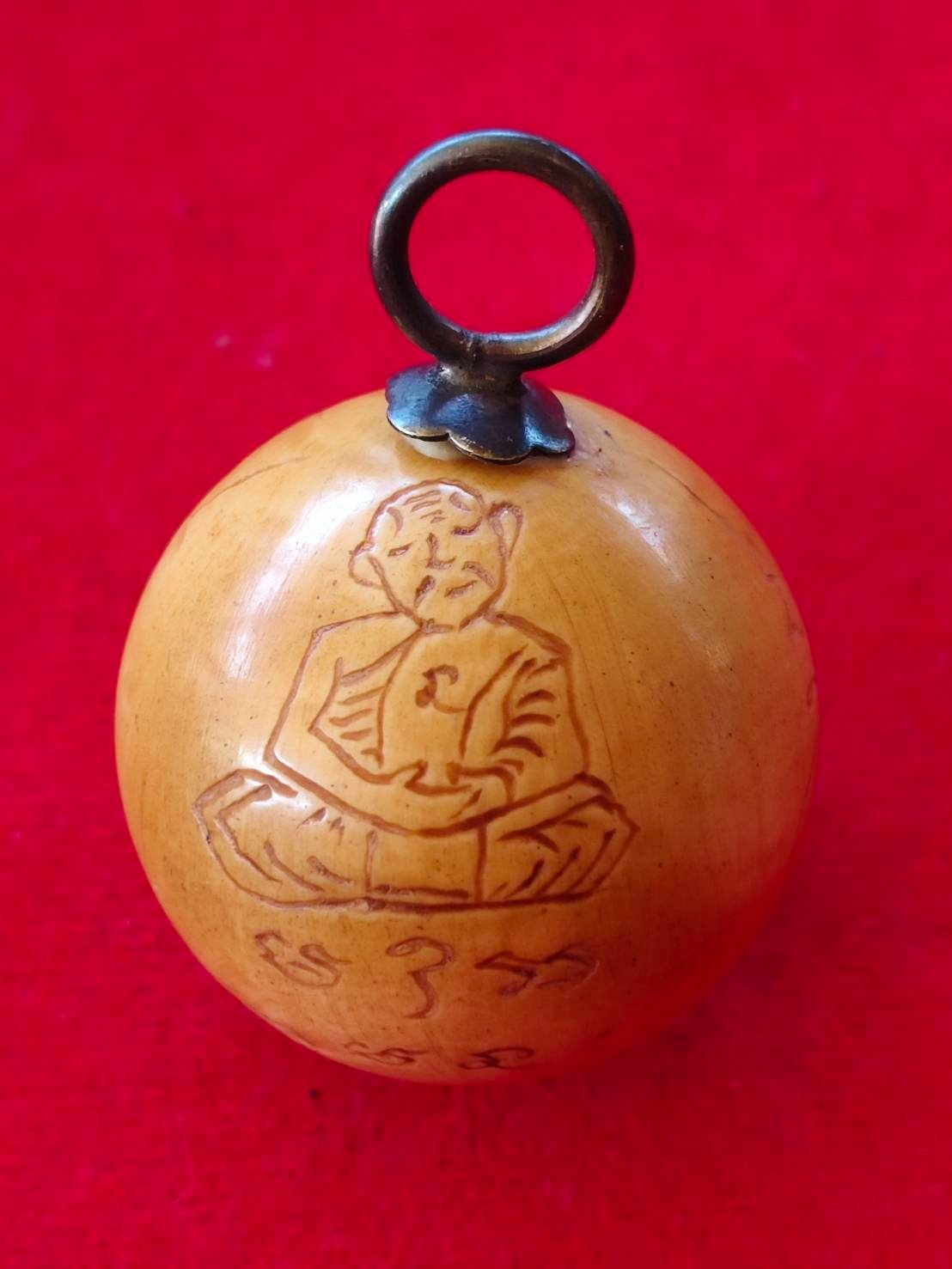 306842 ลูกสะกดหลวงปู่ทิม  เนื้อกระดูกช้าง  พ.ศ. 2517-2518  วัดละหารไร่ จ.ระยอง 